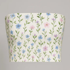 Floral-patterned tube top on a gray background