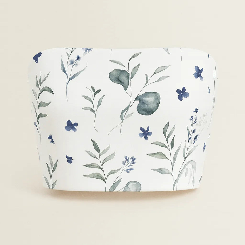 Floral-patterned pouch on a beige background