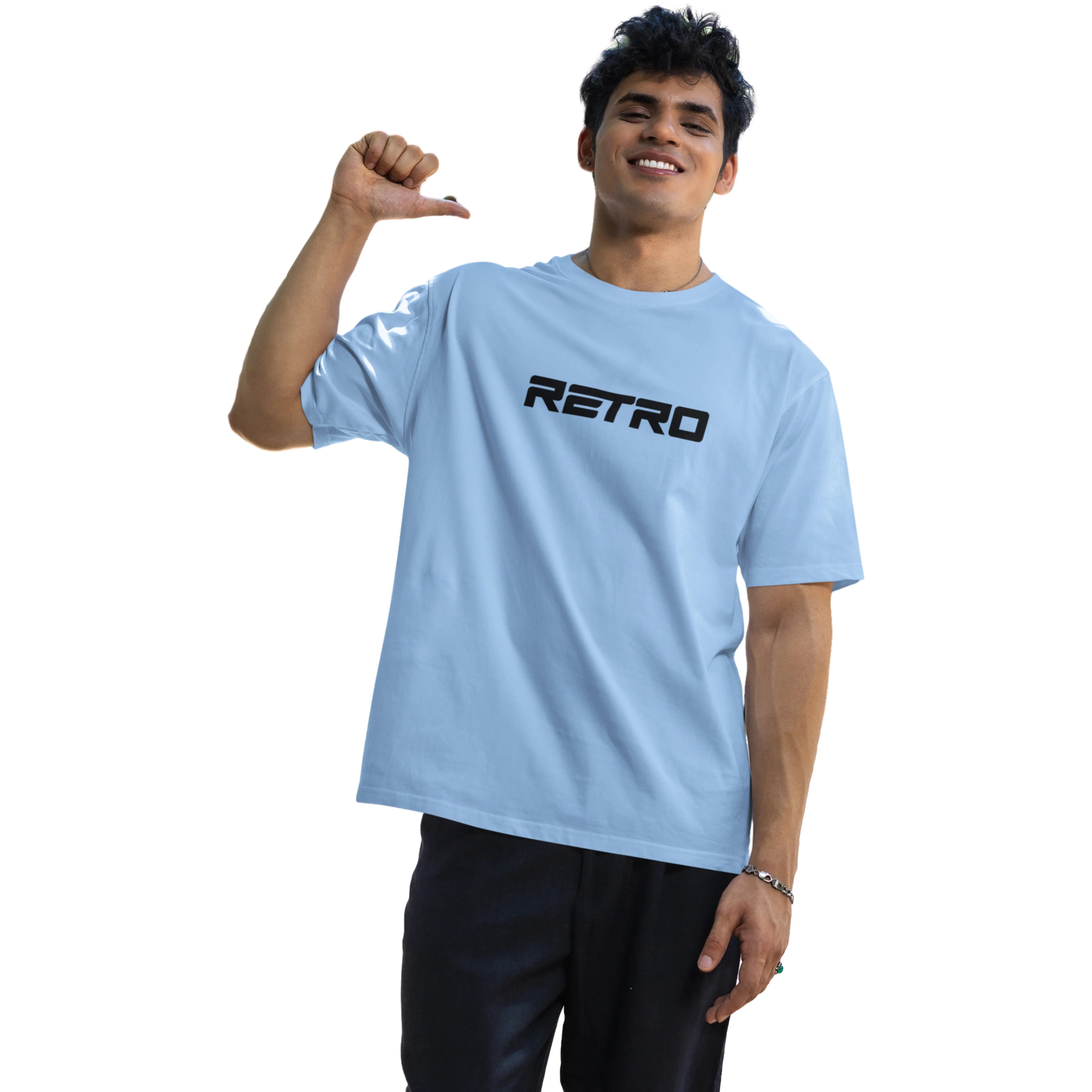 Person wearing a light blue t-shirt with 'RETRO' printed on it, giving a thumbs-up gesture.