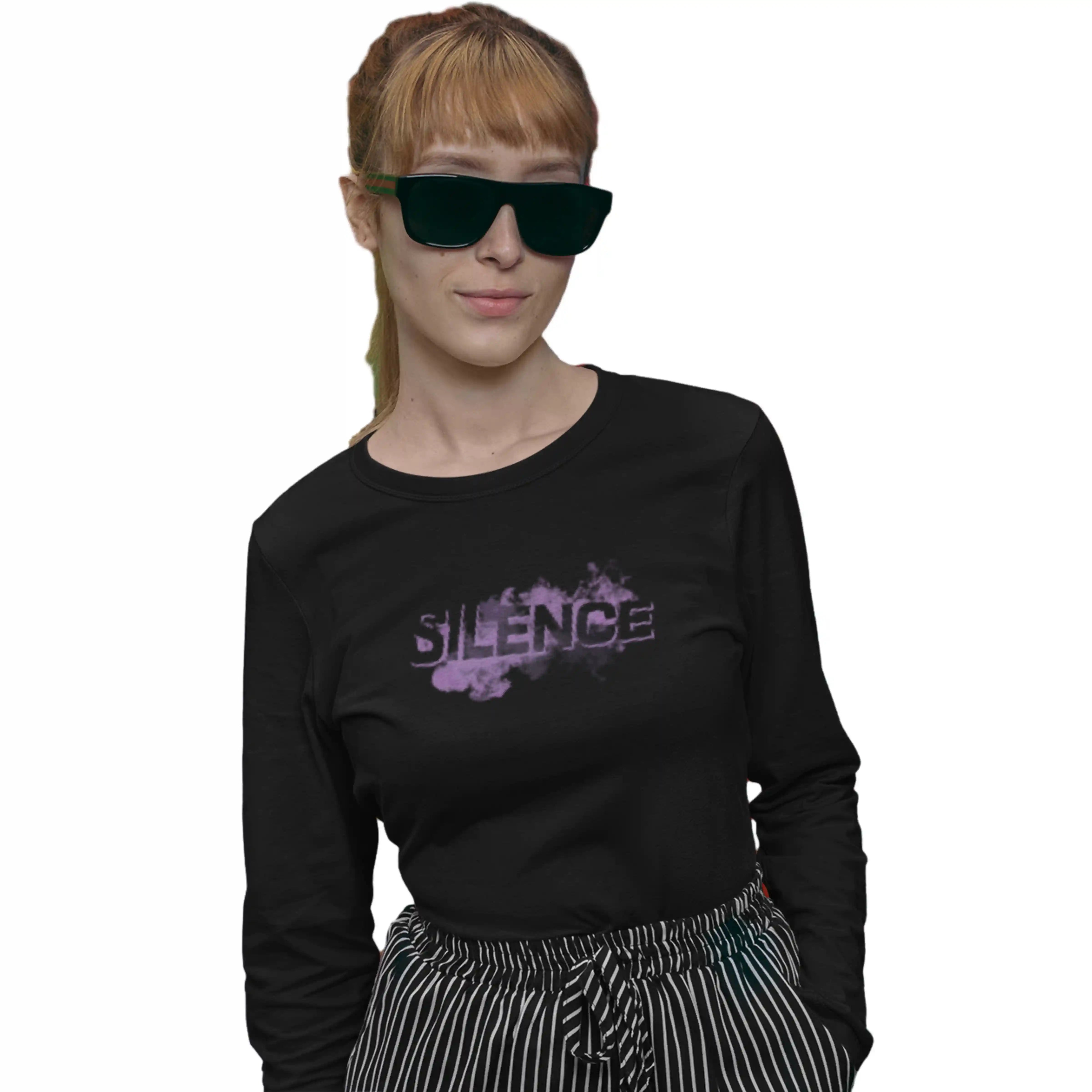 Person wearing a black long-sleeve shirt with 'SILENCE' print and sunglasses on a white background