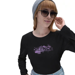 Person wearing a black long-sleeve shirt with 'SILENCE' design on a white background