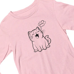 Pink t-shirt with a black line drawing of a cat and speech bubble on a white background