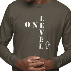 Person wearing a dark green long-sleeve shirt with 'ONE LEVEL' text design.
