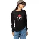 Person wearing a black long-sleeve shirt with a graphic and text, blue jeans, and a hat on a white background