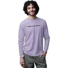 Man wearing a purple long-sleeve shirt with text on a white background