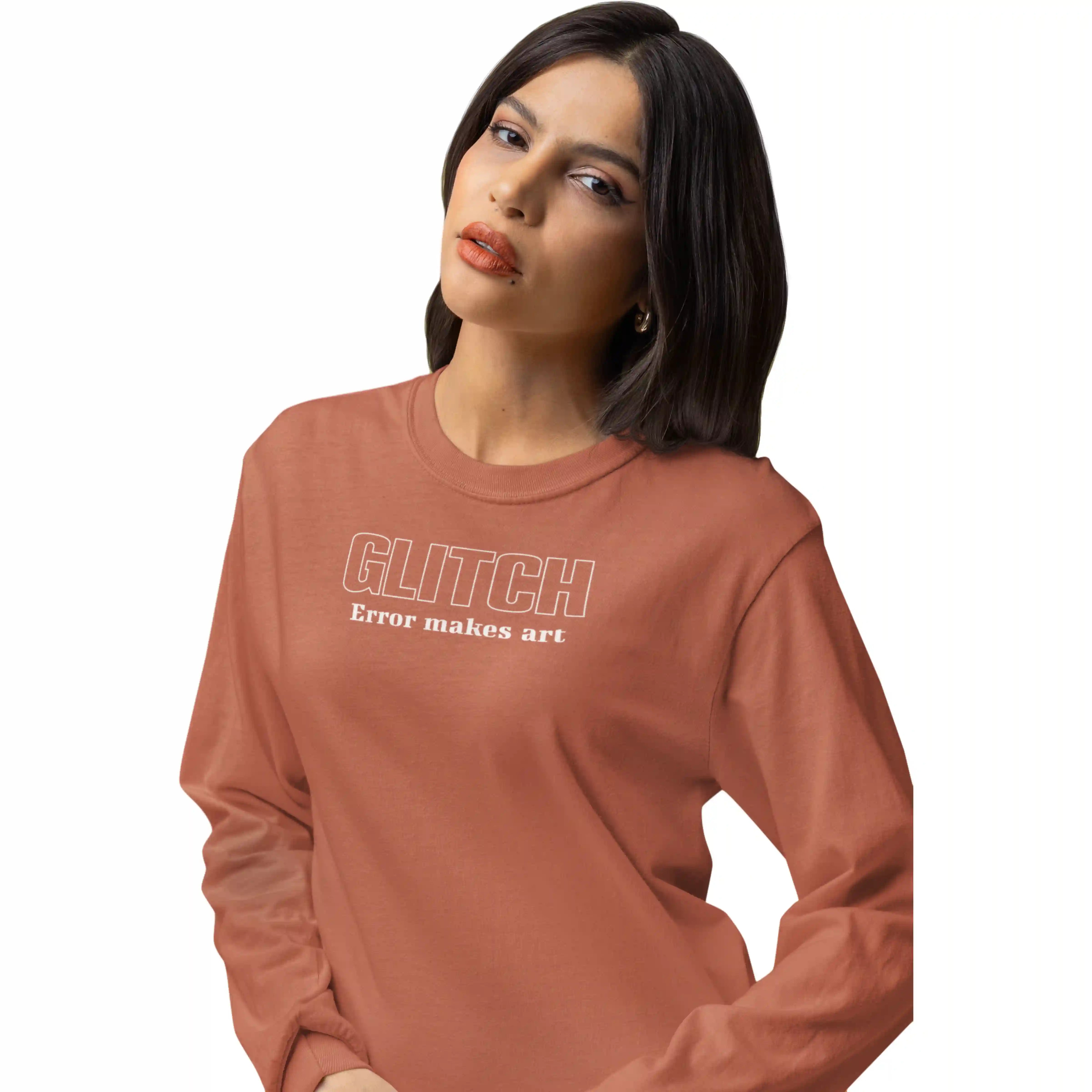 Woman wearing a brown long-sleeve shirt with 'GLITCH Error makes art' text on a white background