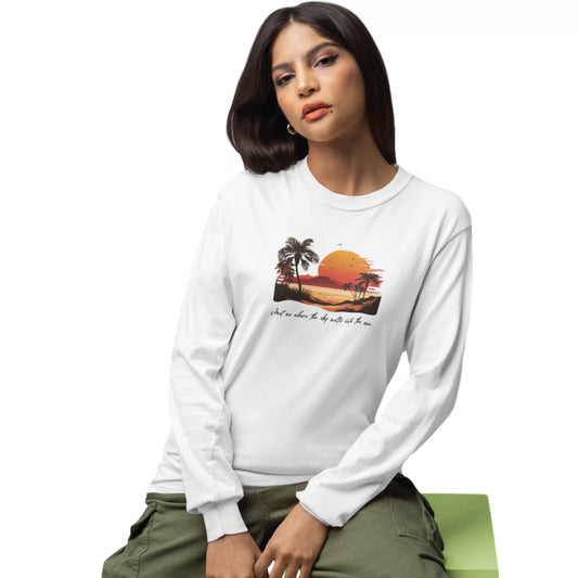 Woman wearing a white sweatshirt with a tropical design on a white background