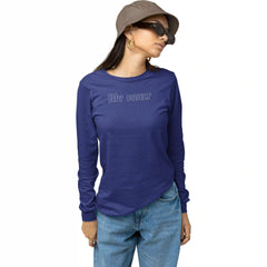 Person wearing a blue long-sleeve shirt with 'My Fault' text, sunglasses, and a hat on a white background