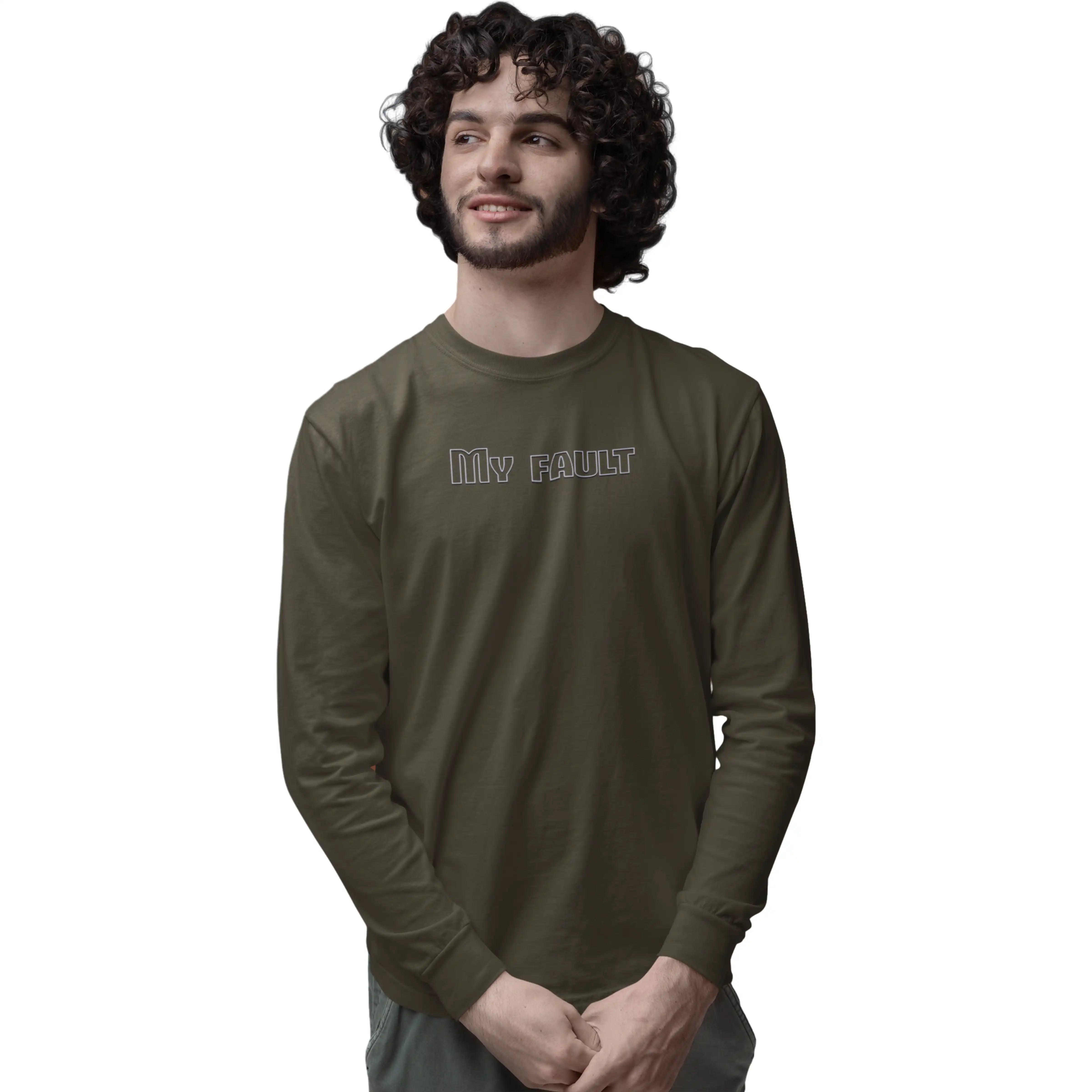 Man wearing a green long-sleeve shirt with text on a white background