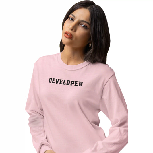 Person wearing a pink sweatshirt with 'DEVELOPER' text on a white background