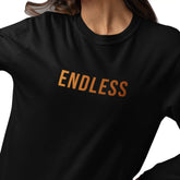 Black sweatshirt with 'ENDLESS' text in orange on a white background