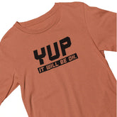 Orange t-shirt with black text 'YUP IT WILL BE OK.' on a white background