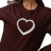 Brown sweatshirt with a white heart design on a plain background