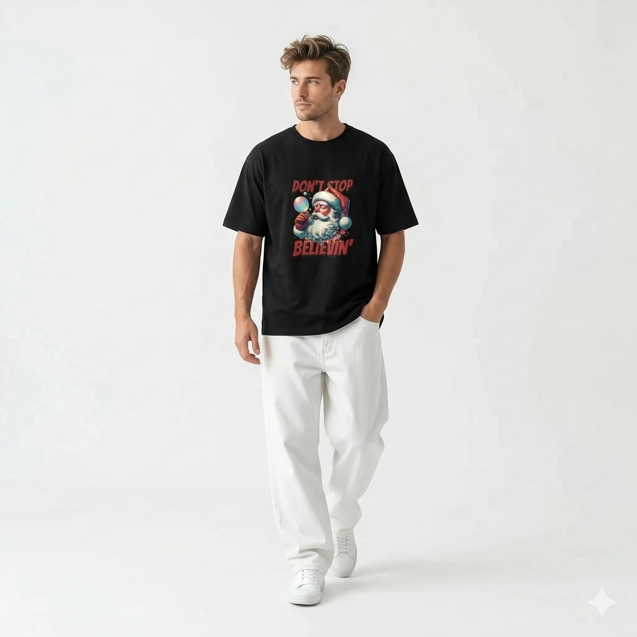 Man wearing a black t-shirt with a graphic design on a white background