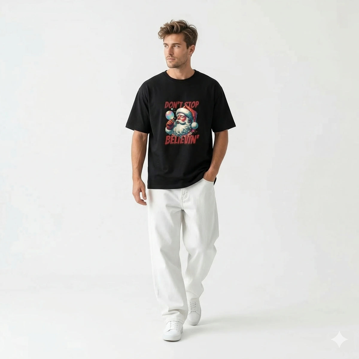 Man wearing a black t-shirt with a graphic design on a white background