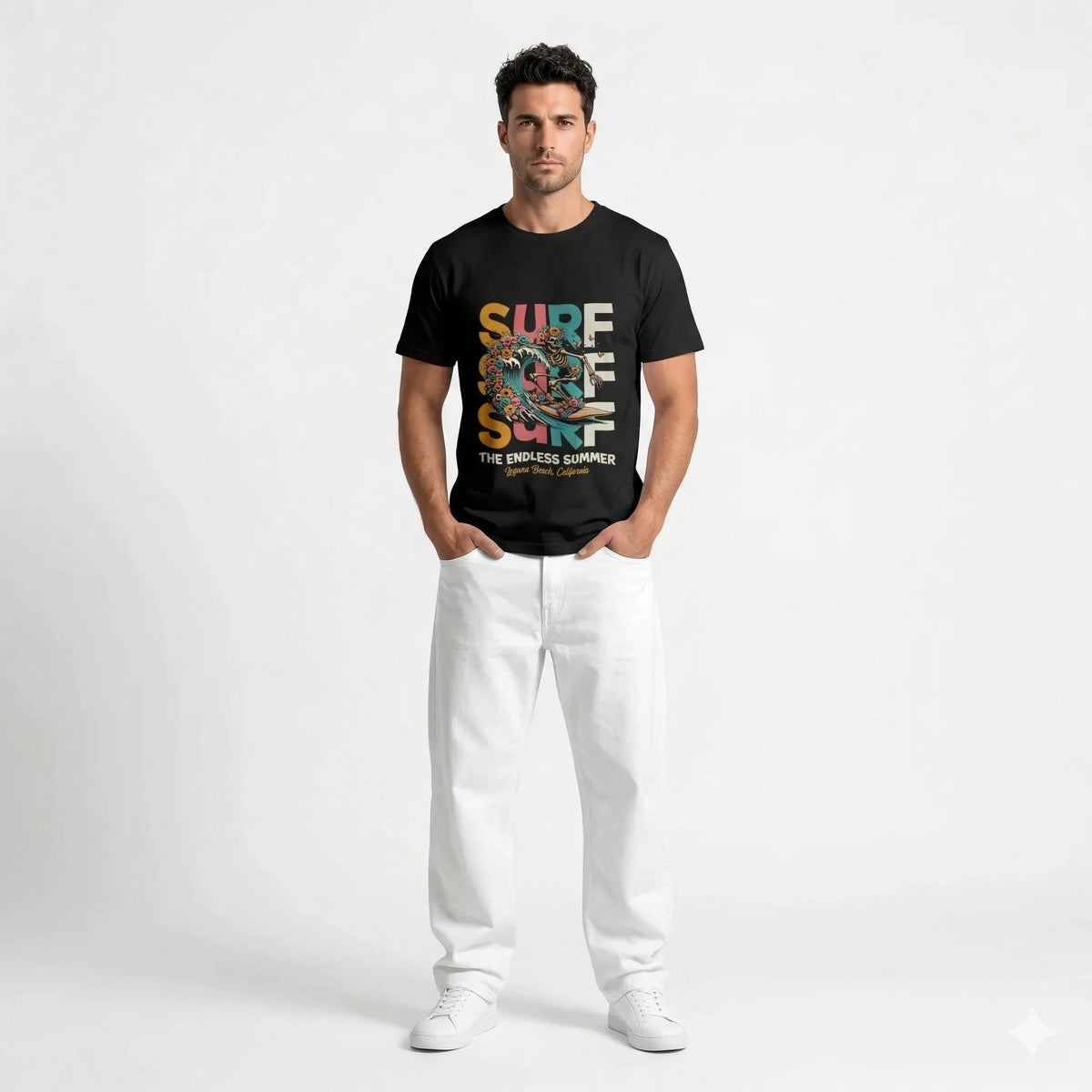 Black t-shirt with colorful 'Surf The Endless Summer' design on a hanger against a white wall.