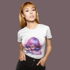 Woman wearing a white t-shirt with a colorful graphic design on a plain background