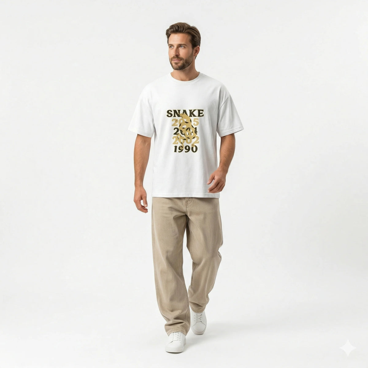 Person wearing a white t-shirt with gold text outdoors