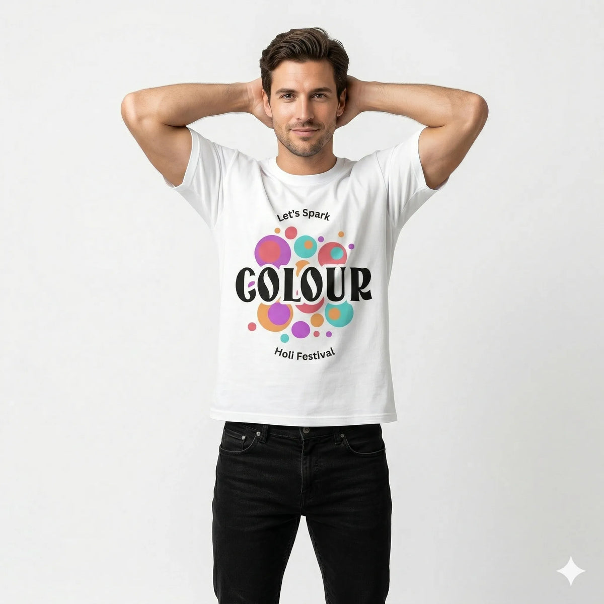 Man wearing a white t-shirt with colorful text and design on a plain background
