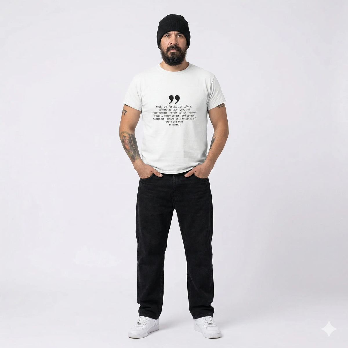 Man wearing a white t-shirt with text and black pants on a white background