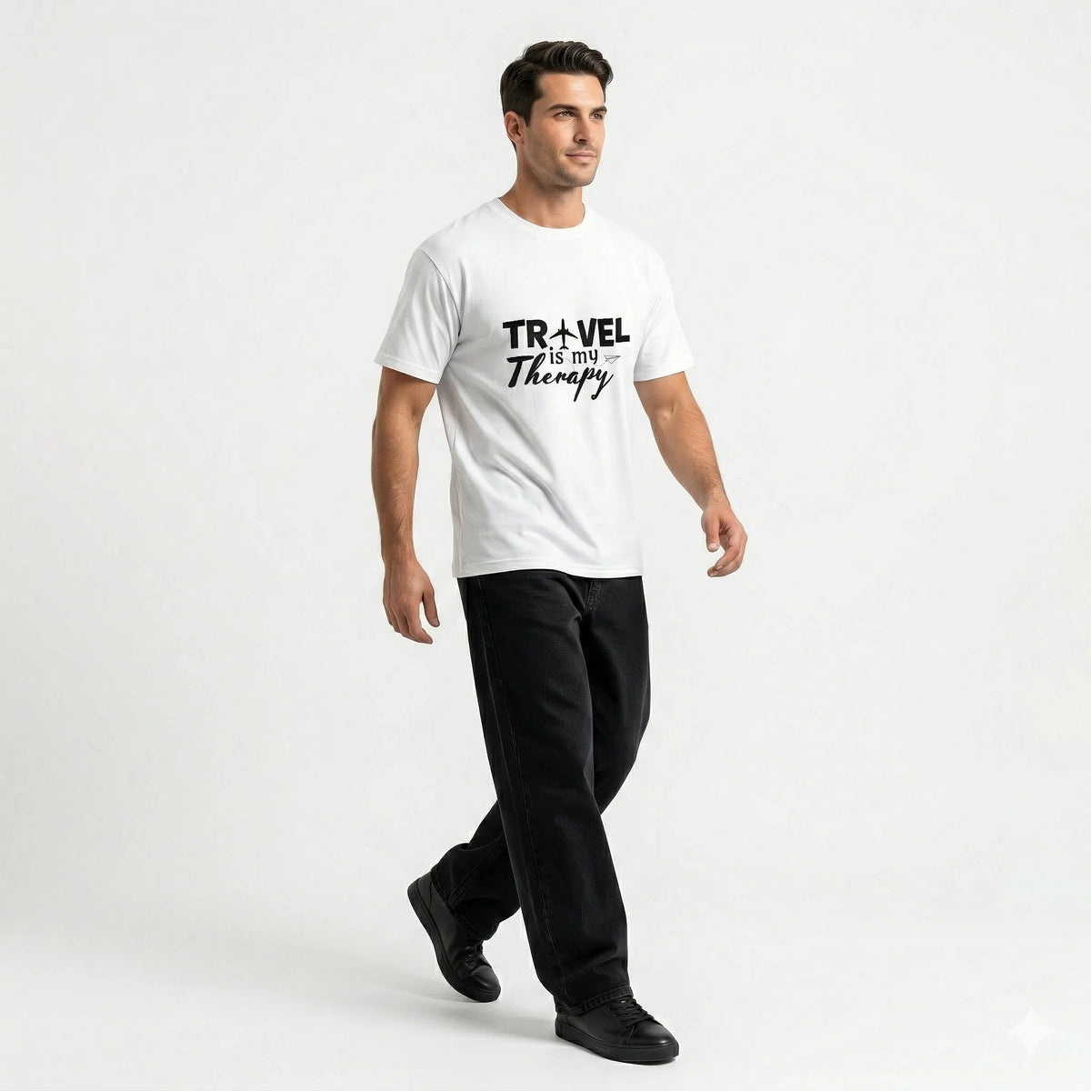 Person wearing a white t-shirt with 'Travel is my Therapy' text design on a dark background