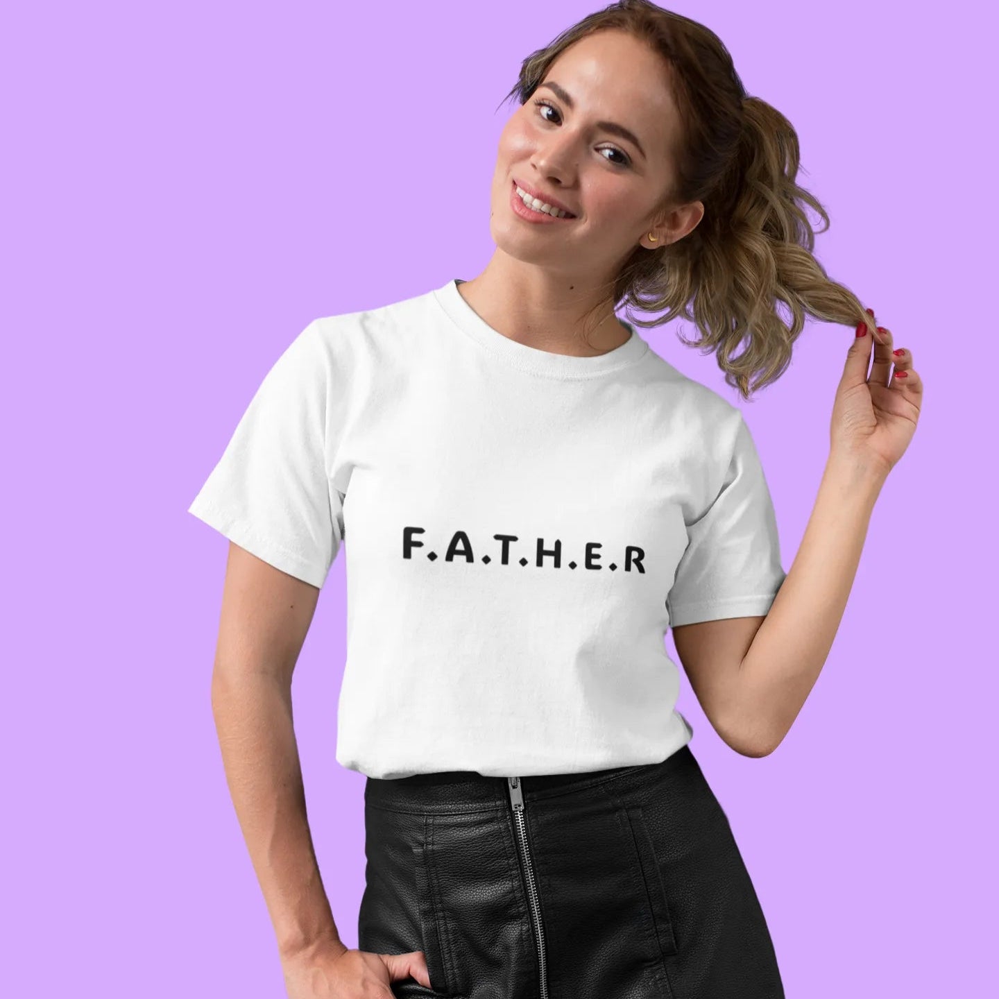Woman wearing a white t-shirt with 'F.A.T.H.E.R.' text on a purple background