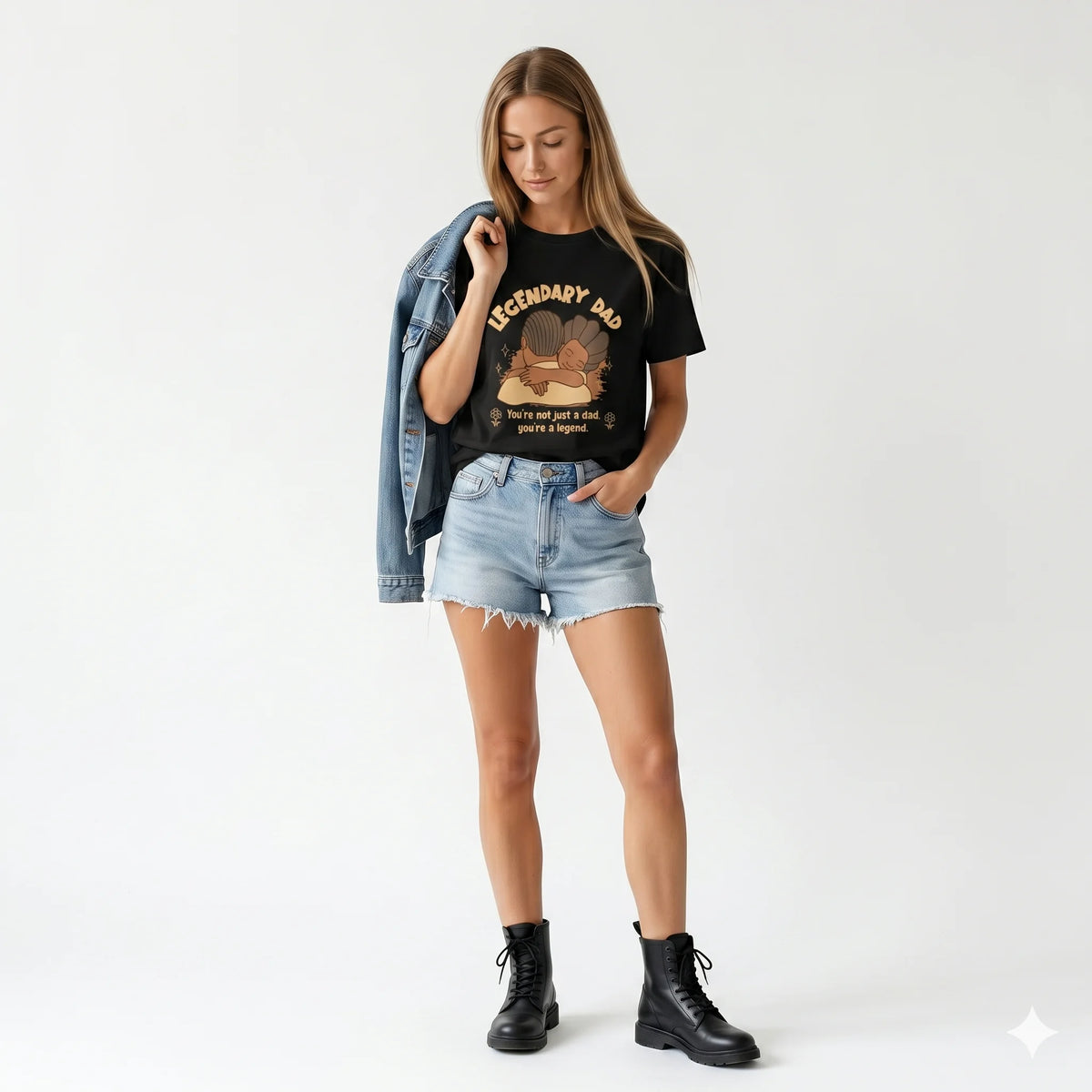 Woman wearing a black t-shirt with a graphic design in a room with vintage equipment.