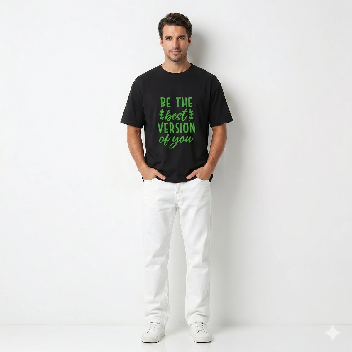 Man wearing a black t-shirt with motivational text on a white background