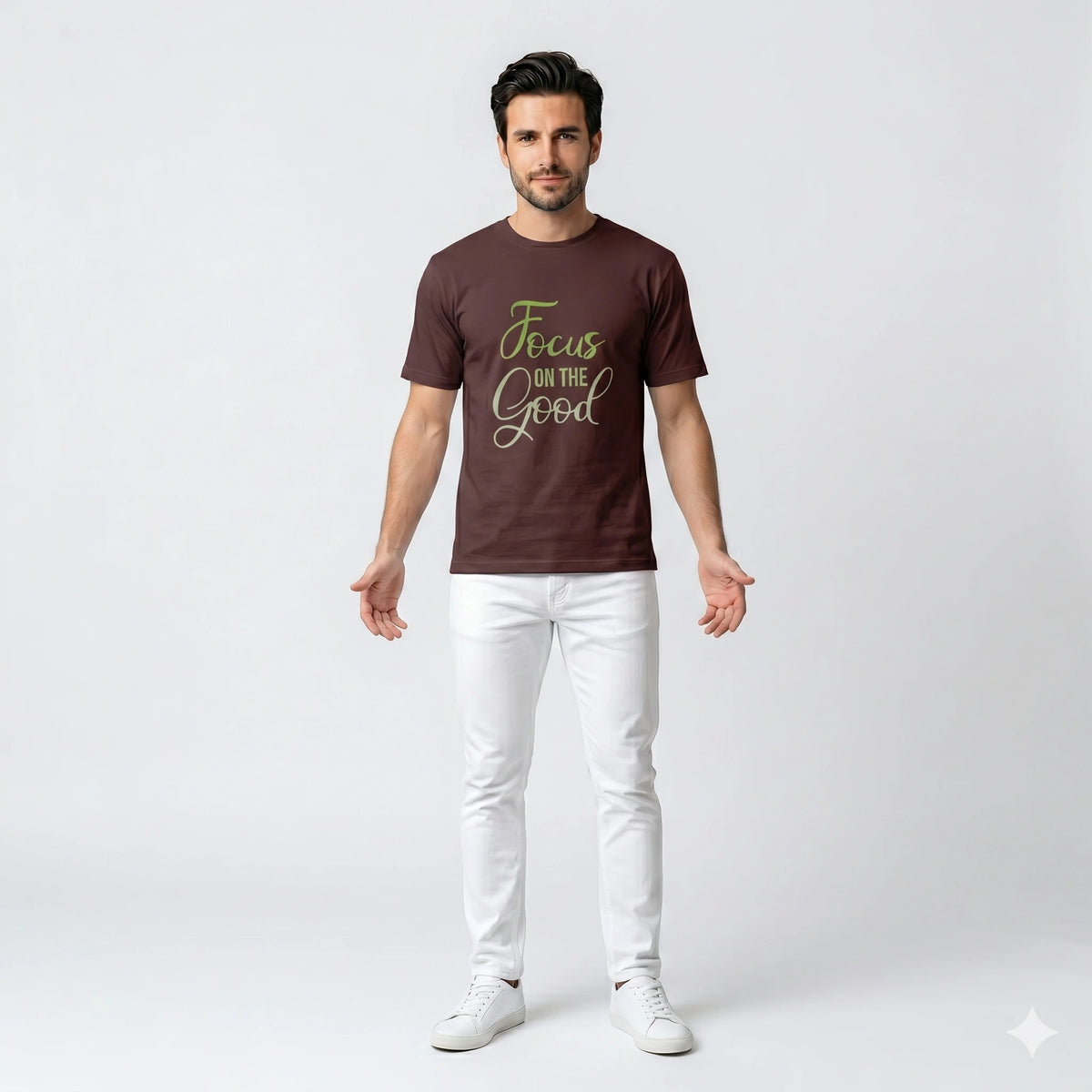 Man wearing a brown t-shirt with 'Focus on the Good' text on a white background