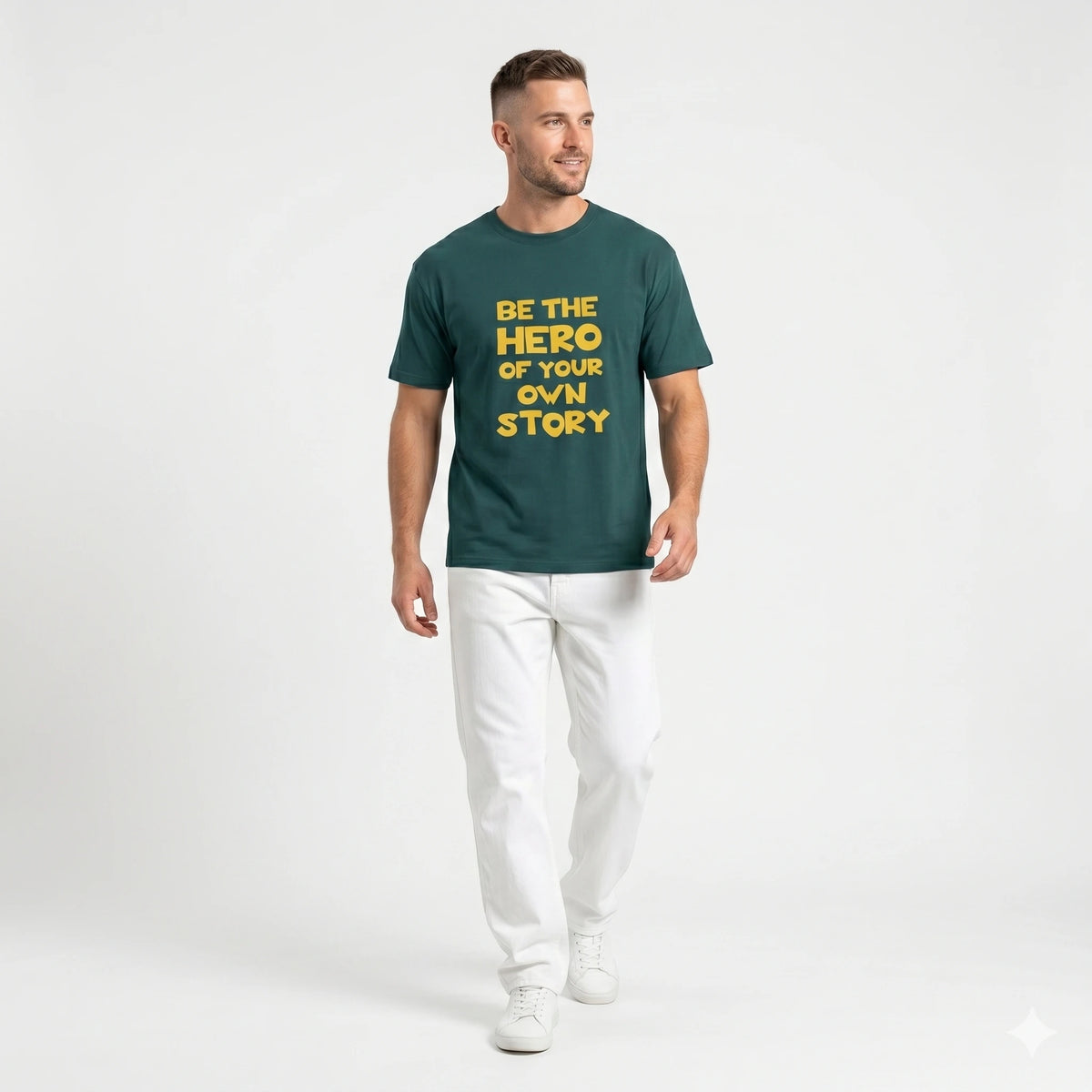 Man wearing a green t-shirt with motivational text on a white background
