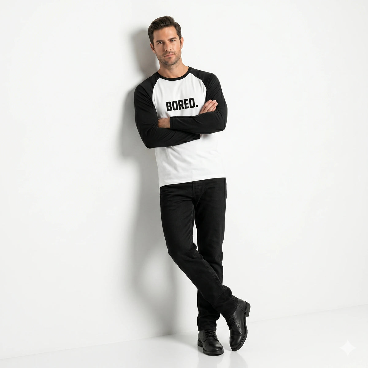 Man wearing a black and white long-sleeve shirt with 'BORED.' text on a white background