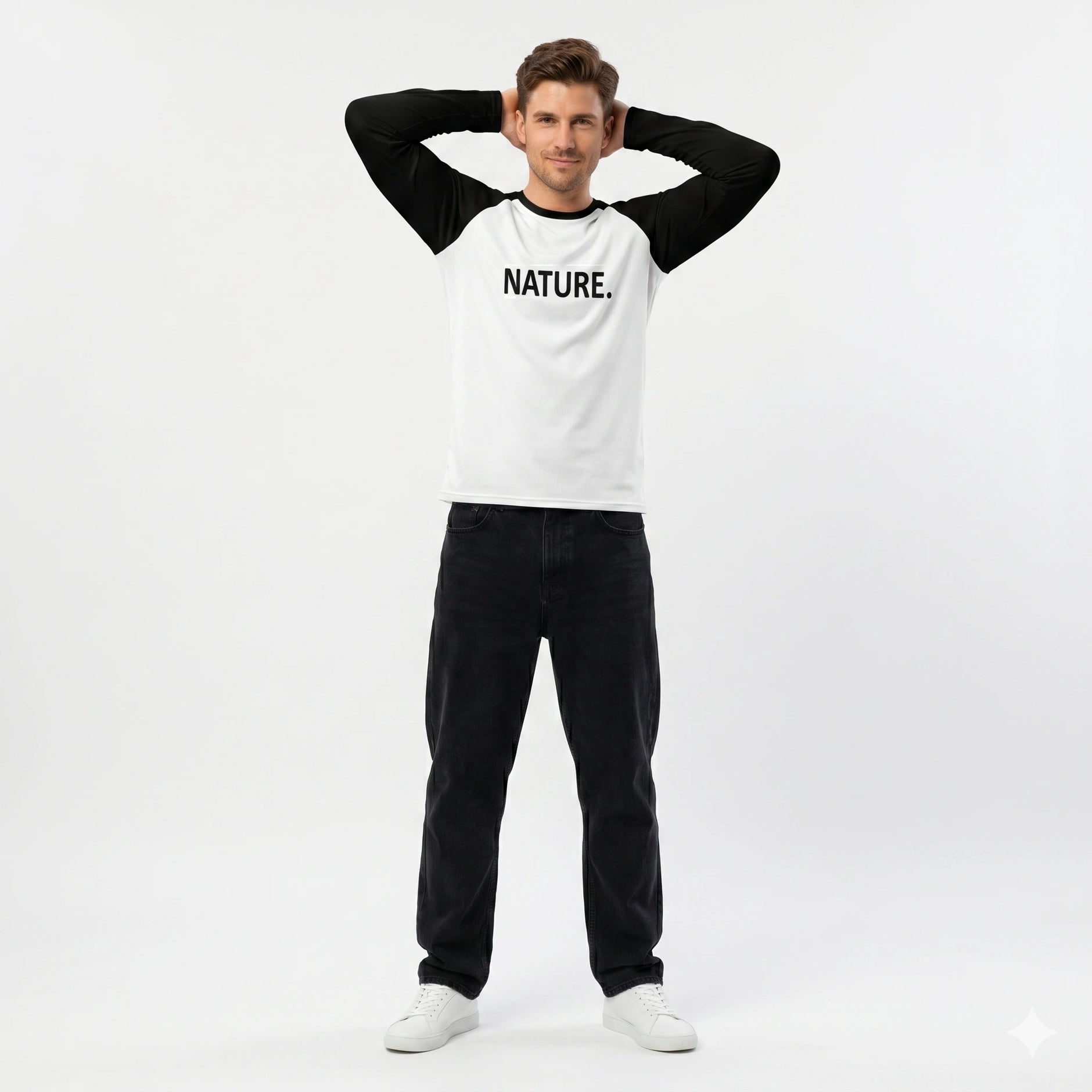 Person wearing a white and black long-sleeve shirt with 'NATURE.' text on a white background
