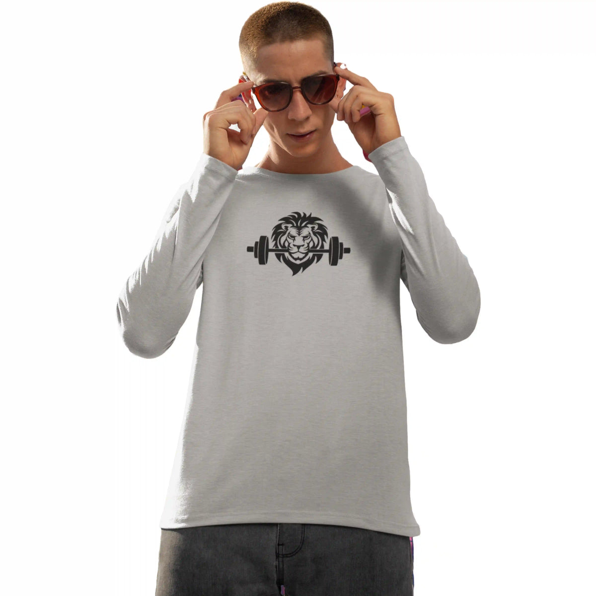 Person wearing a gray long-sleeve shirt with a lion and barbell graphic on a white background