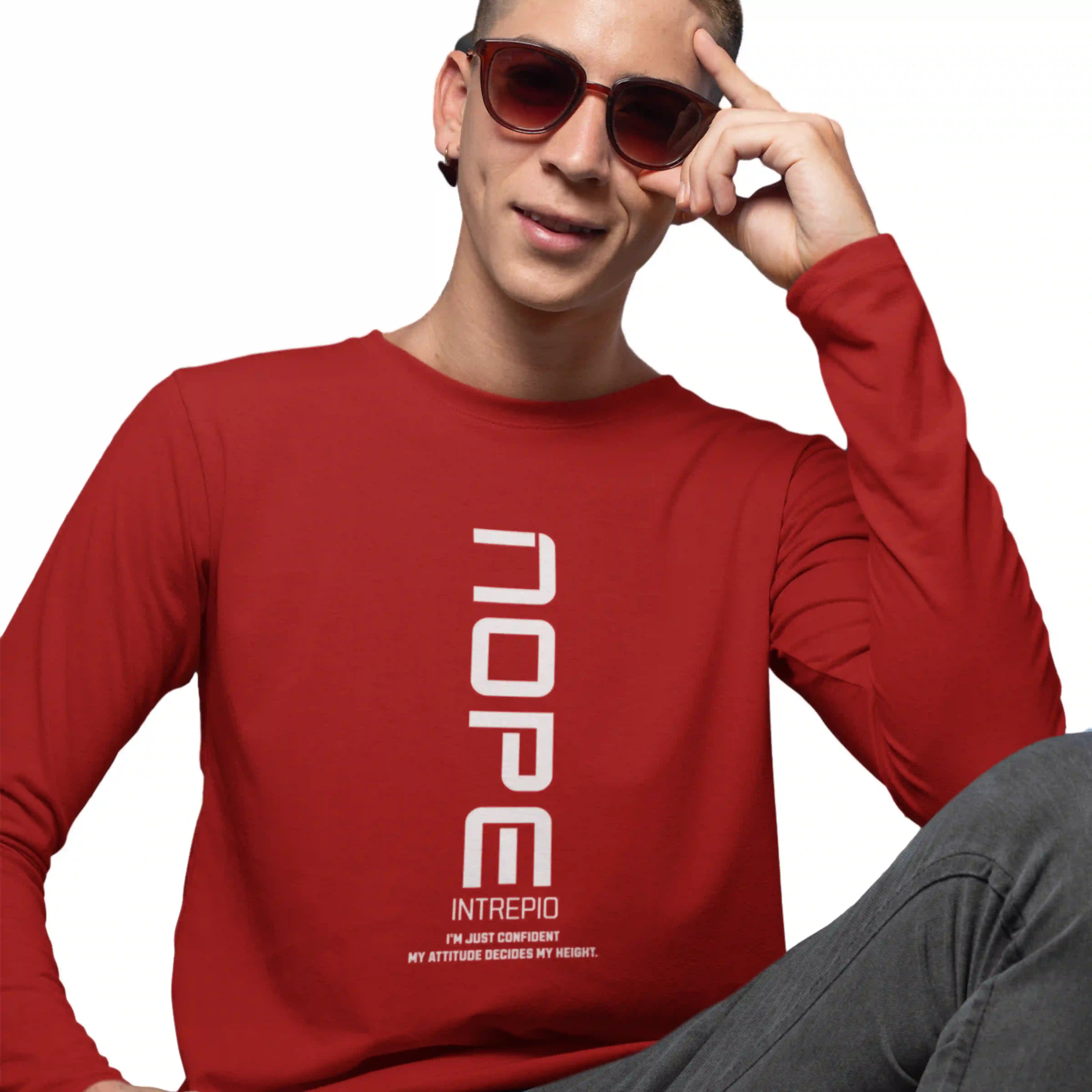 Person wearing a red long-sleeve shirt with 'Dope Intrepid' text, sitting against a white background.