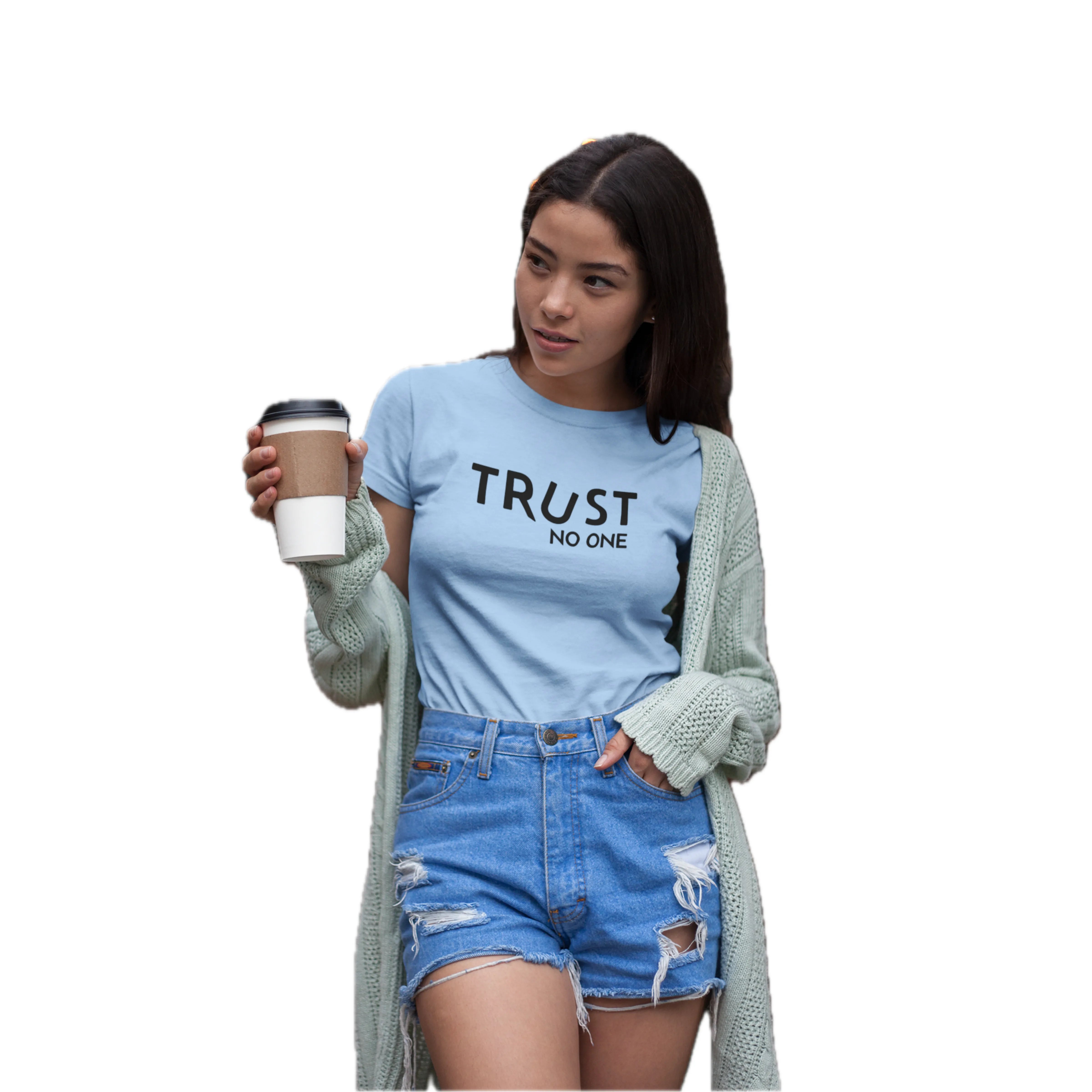 Woman wearing a light blue t-shirt with 'TRUST NO ONE' text, holding a coffee cup.
