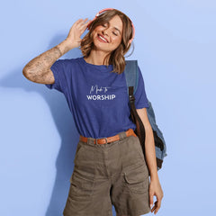 Woman wearing a blue t-shirt with text, standing against a light blue background