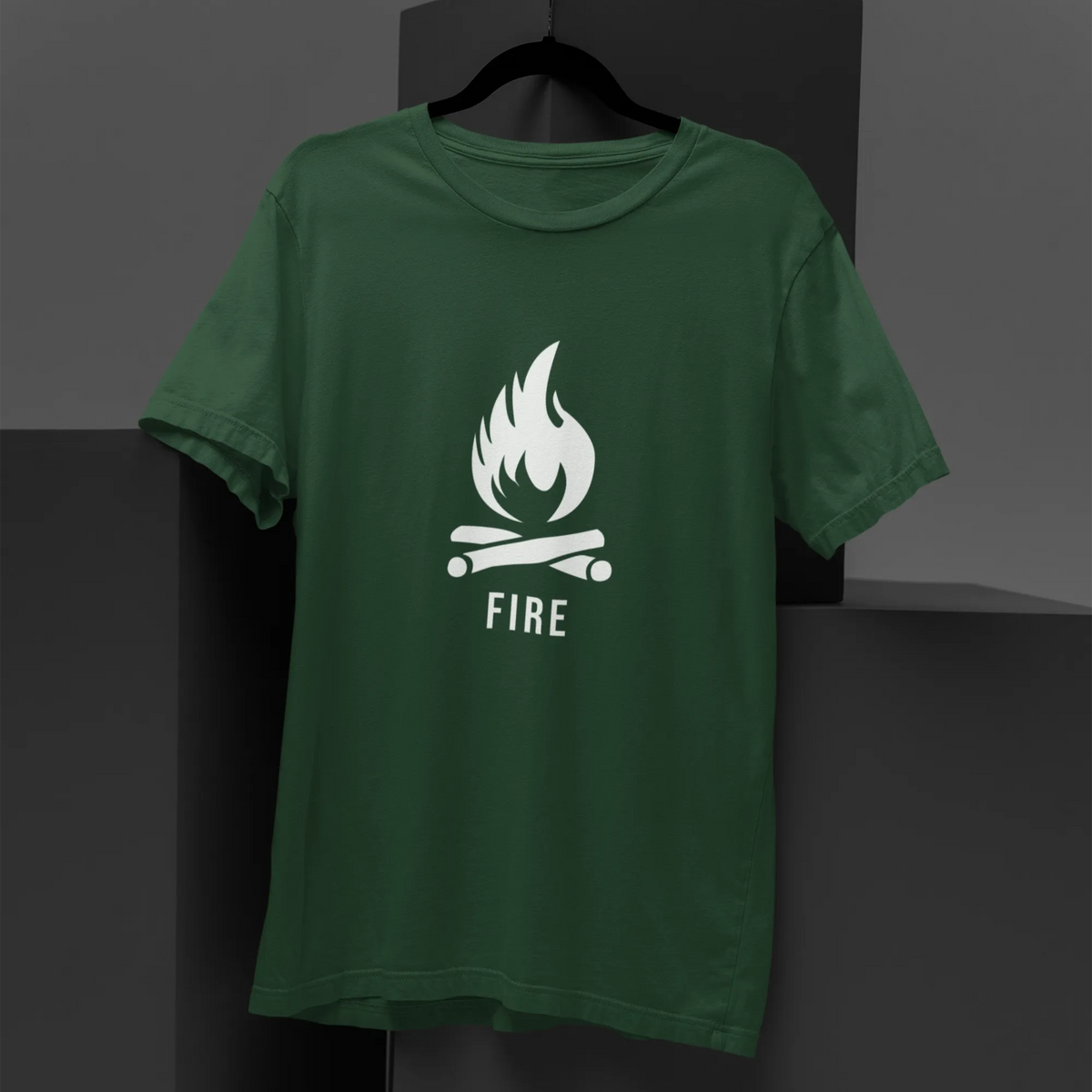 Green t-shirt with a white graphic and text on a dark background