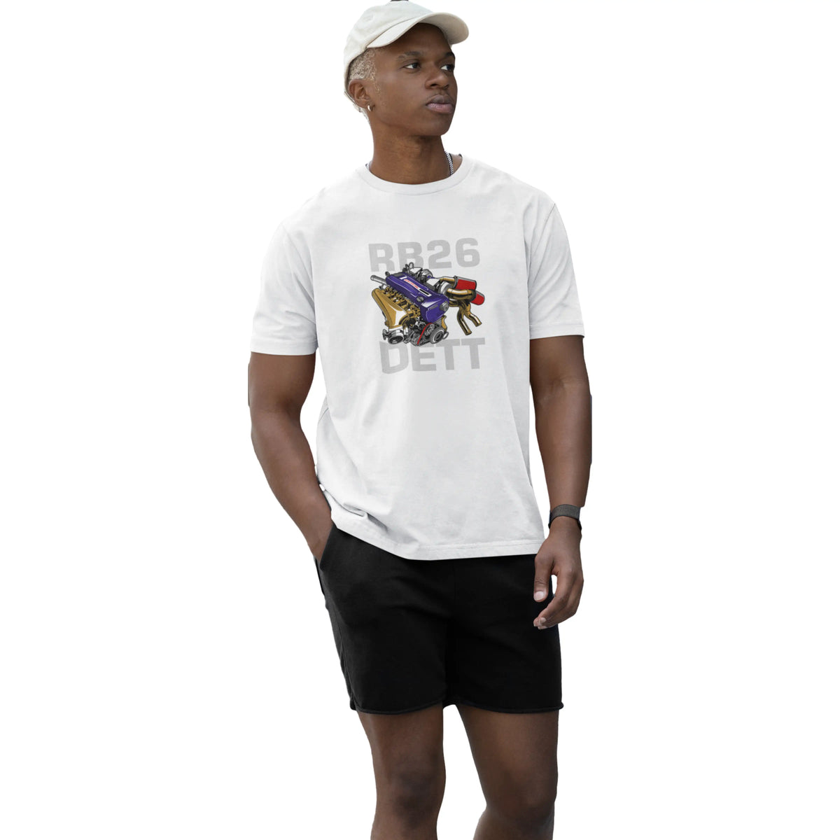 Man wearing a white t-shirt with a graphic design in an indoor setting