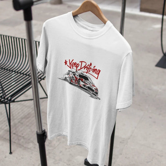 White t-shirt with red and black graphic design on a hanger