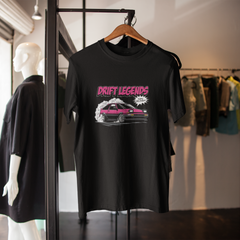 Black t-shirt with 'Drift Legends' design on a hanger in a clothing store.