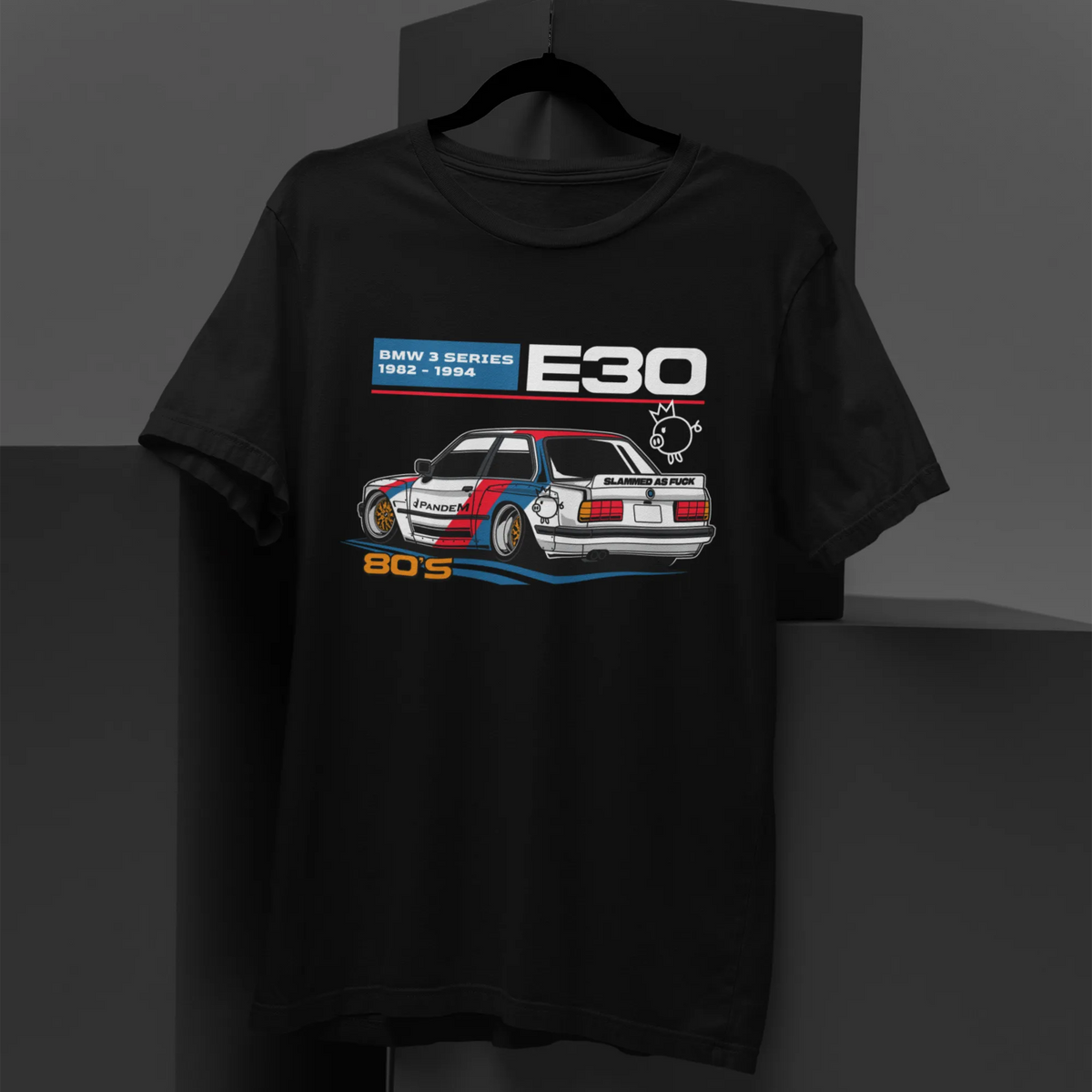 Black t-shirt with car graphic and 'E30' text on a dark background