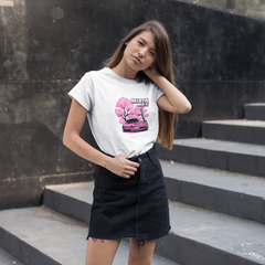 Woman wearing a white t-shirt with a graphic design on black steps.