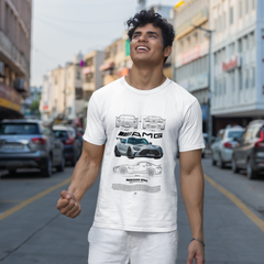 Man wearing a white t-shirt with a car graphic on a city street