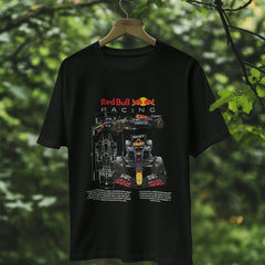 Black t-shirt with Red Bull Racing graphic on a hanger against a green leafy background