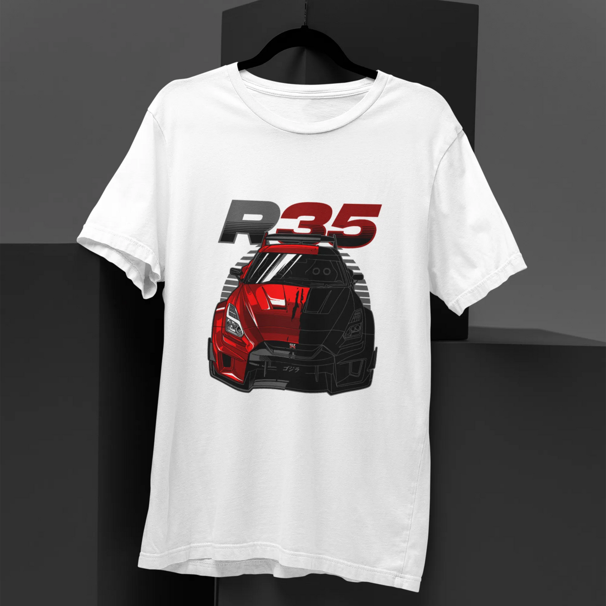 White t-shirt with a red and black car graphic and 'R35' text on a dark background