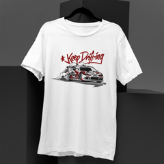 White t-shirt with car graphic and 'Keep Drifting' text on a black background