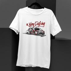 White t-shirt with a graphic of a car and 'Keep Drifting' text on a black background