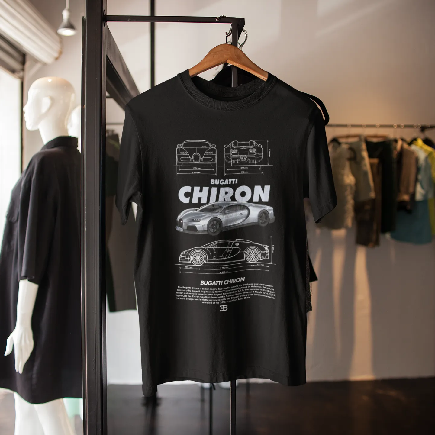 Black t-shirt with Bugatti Chiron design on a hanger in a store setting