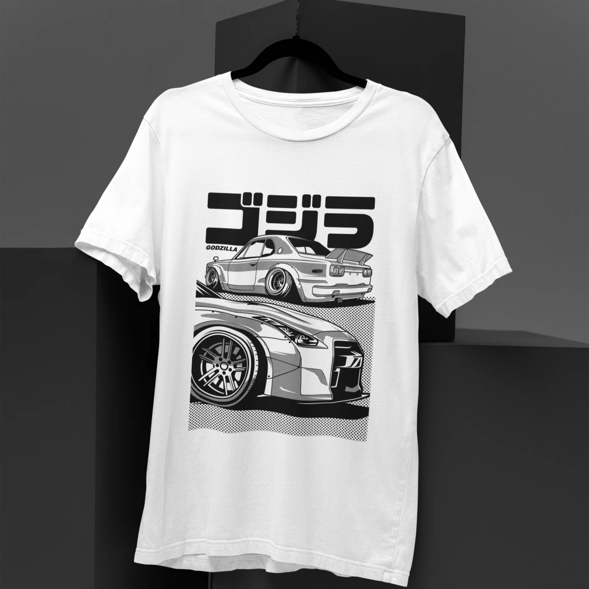 White t-shirt with car graphic and text on a black background