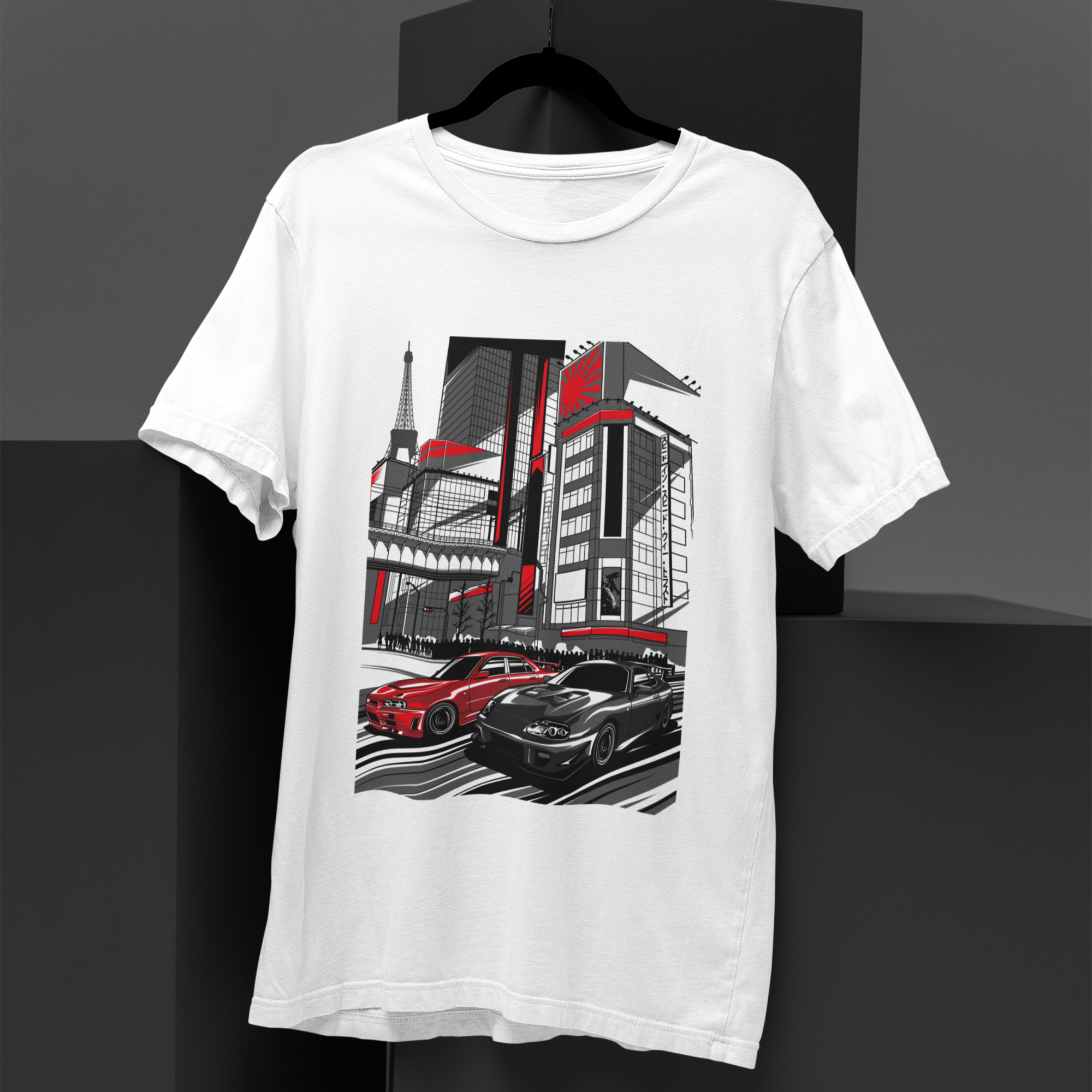 White t-shirt with a graphic design of cars and buildings on a black background